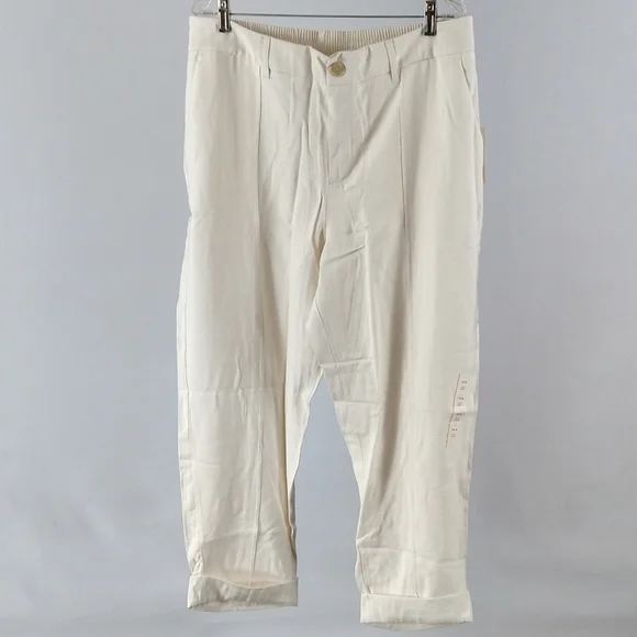Cream colored high rise slim fit effortless pintuck ankle pants - Picture 2 of 4